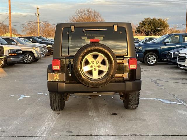 used 2015 Jeep Wrangler Unlimited car, priced at $15,899