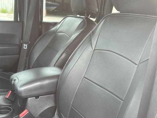 used 2014 Jeep Wrangler Unlimited car, priced at $16,899