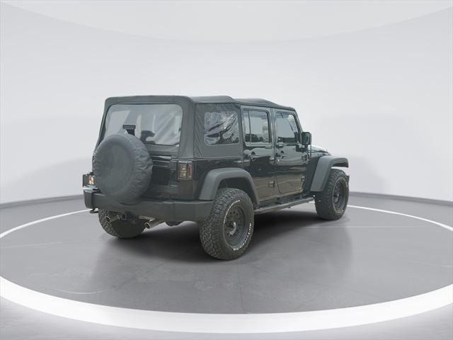 used 2014 Jeep Wrangler Unlimited car, priced at $16,899