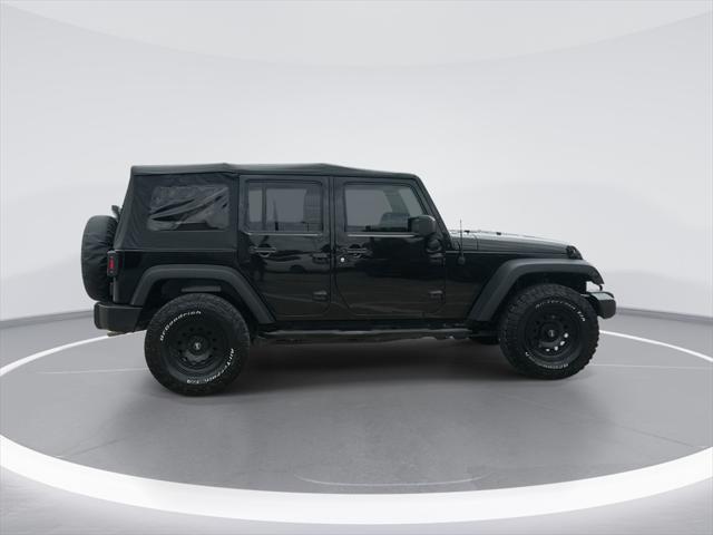used 2014 Jeep Wrangler Unlimited car, priced at $16,899