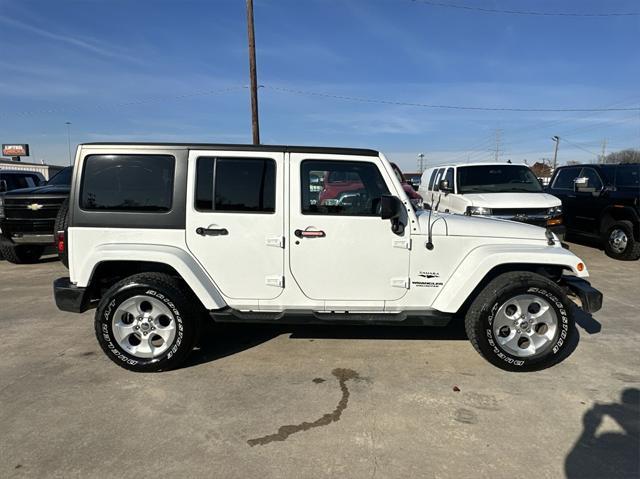 used 2014 Jeep Wrangler Unlimited car, priced at $15,999