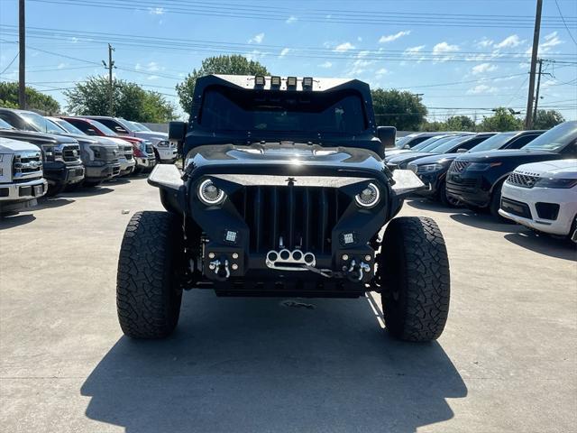 used 2016 Jeep Wrangler Unlimited car, priced at $20,846