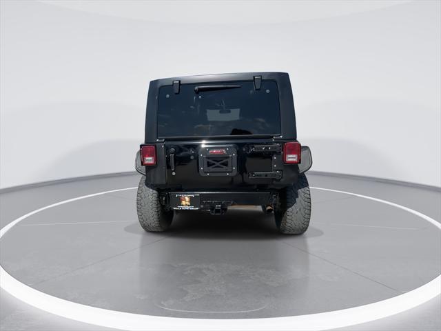 used 2016 Jeep Wrangler Unlimited car, priced at $20,846