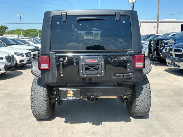 used 2016 Jeep Wrangler Unlimited car, priced at $20,846