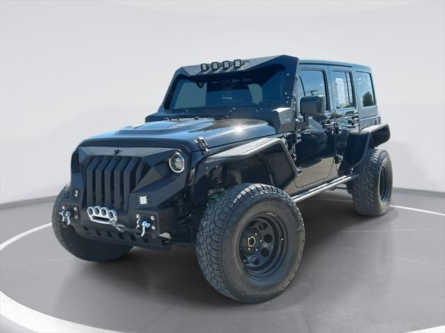 used 2016 Jeep Wrangler Unlimited car, priced at $20,846