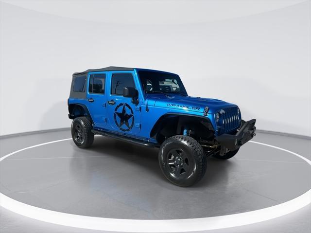 used 2015 Jeep Wrangler Unlimited car, priced at $16,999