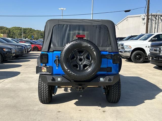 used 2015 Jeep Wrangler Unlimited car, priced at $16,999