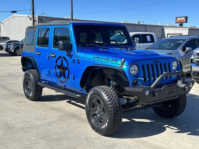 used 2015 Jeep Wrangler Unlimited car, priced at $16,999