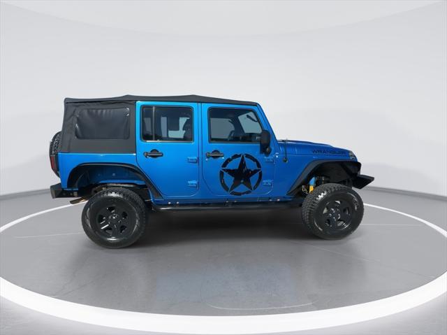 used 2015 Jeep Wrangler Unlimited car, priced at $16,999