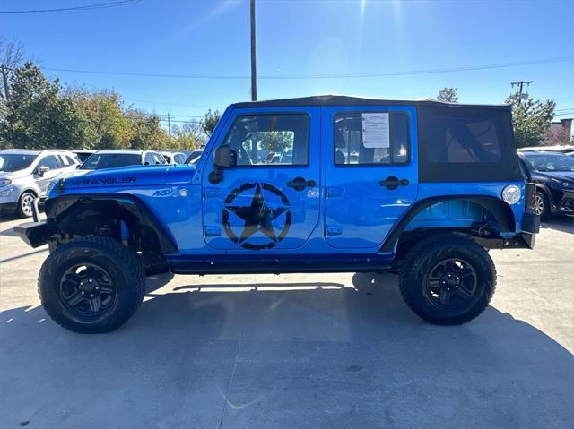 used 2015 Jeep Wrangler Unlimited car, priced at $16,999