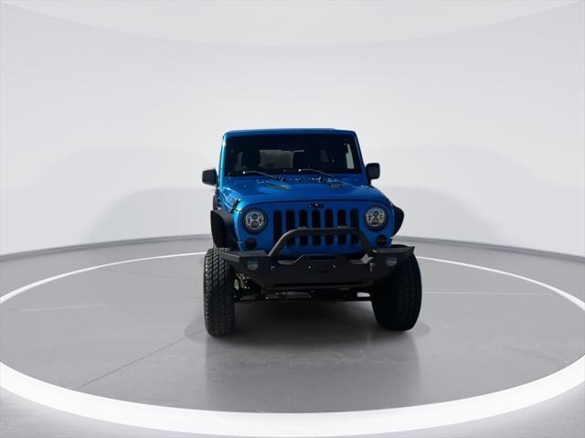 used 2015 Jeep Wrangler Unlimited car, priced at $16,999