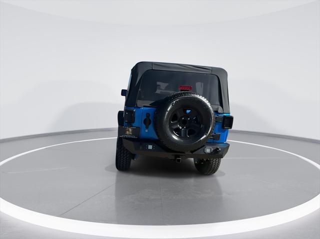 used 2015 Jeep Wrangler Unlimited car, priced at $16,999