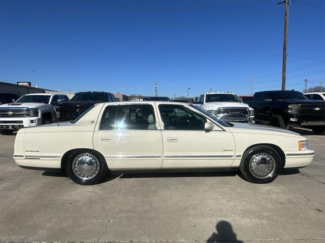 used 1997 Cadillac DeVille car, priced at $9,999