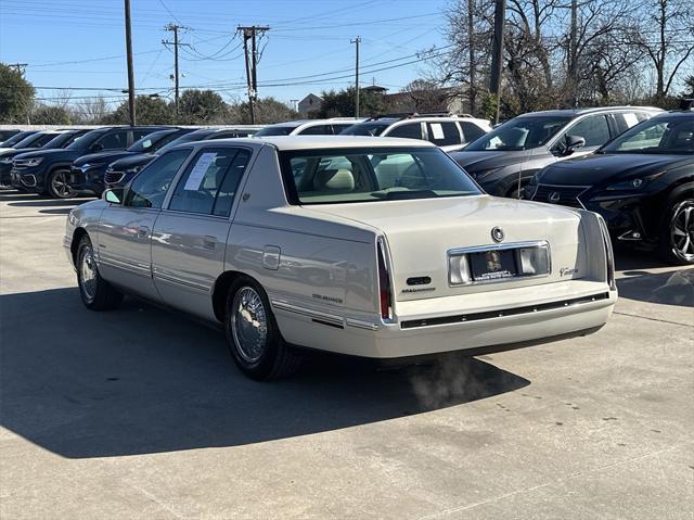 used 1997 Cadillac DeVille car, priced at $9,999