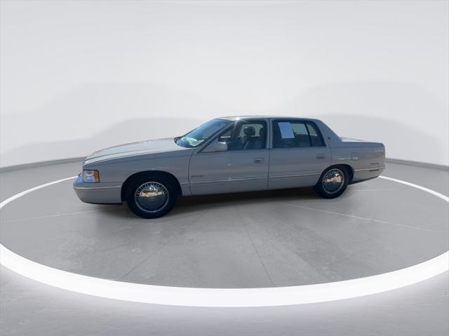 used 1997 Cadillac DeVille car, priced at $9,999