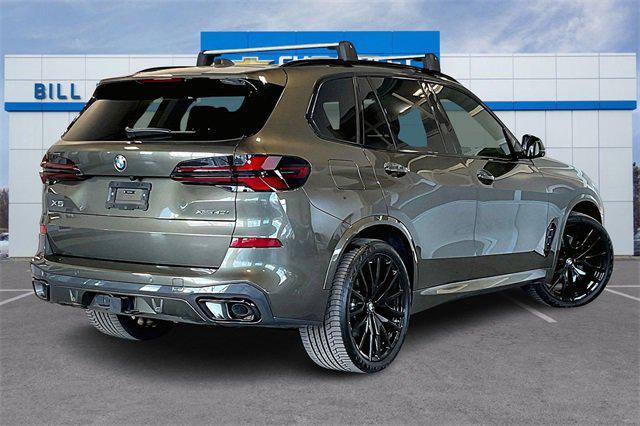 used 2025 BMW X5 car, priced at $69,712