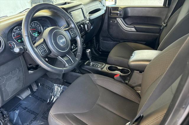 used 2015 Jeep Wrangler Unlimited car, priced at $22,999