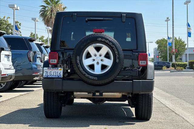 used 2015 Jeep Wrangler Unlimited car, priced at $22,999