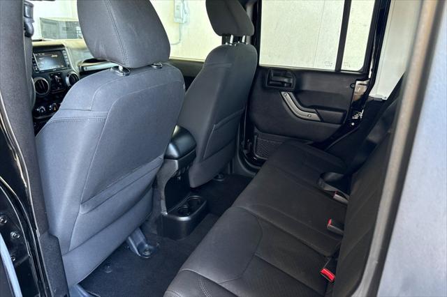 used 2015 Jeep Wrangler Unlimited car, priced at $22,999