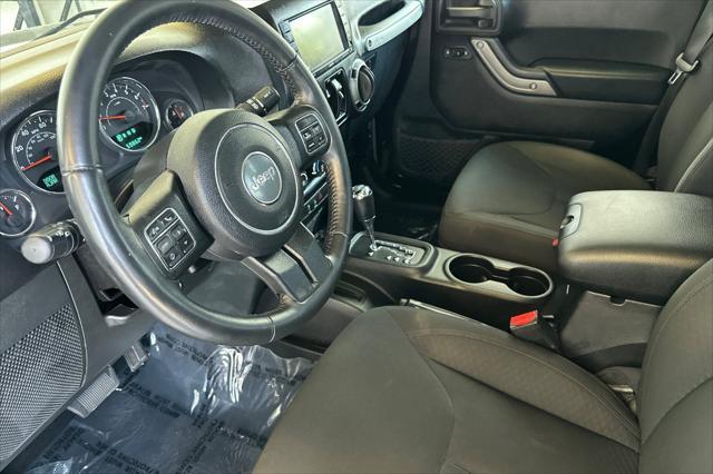 used 2015 Jeep Wrangler Unlimited car, priced at $22,999