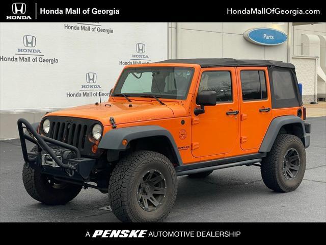 used 2012 Jeep Wrangler Unlimited car, priced at $17,980