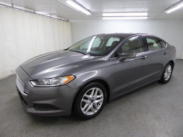 used 2014 Ford Fusion car, priced at $5,000