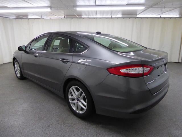 used 2014 Ford Fusion car, priced at $5,000
