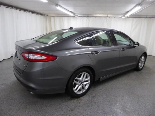 used 2014 Ford Fusion car, priced at $5,000