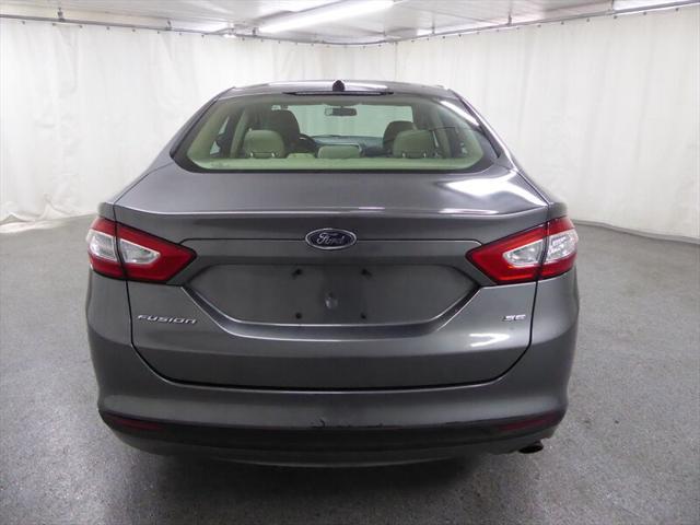 used 2014 Ford Fusion car, priced at $5,000
