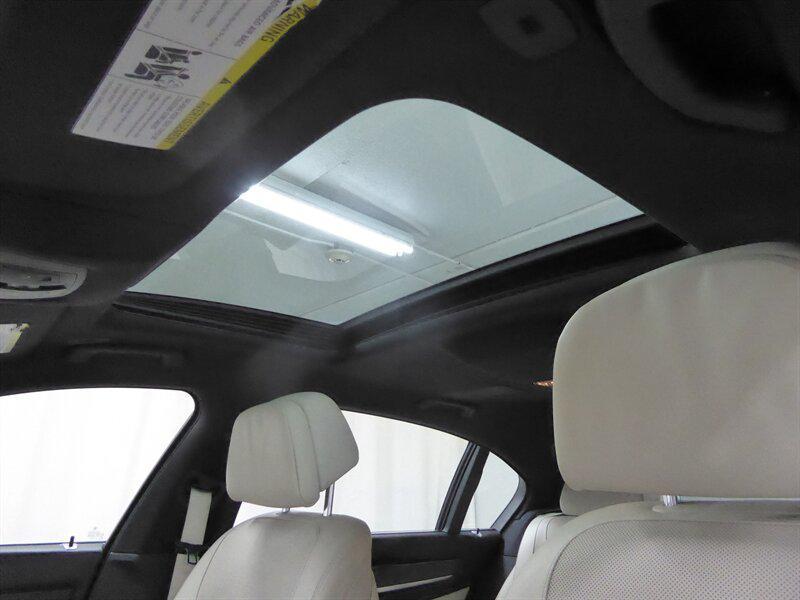 used 2013 BMW 750 car, priced at $12,500