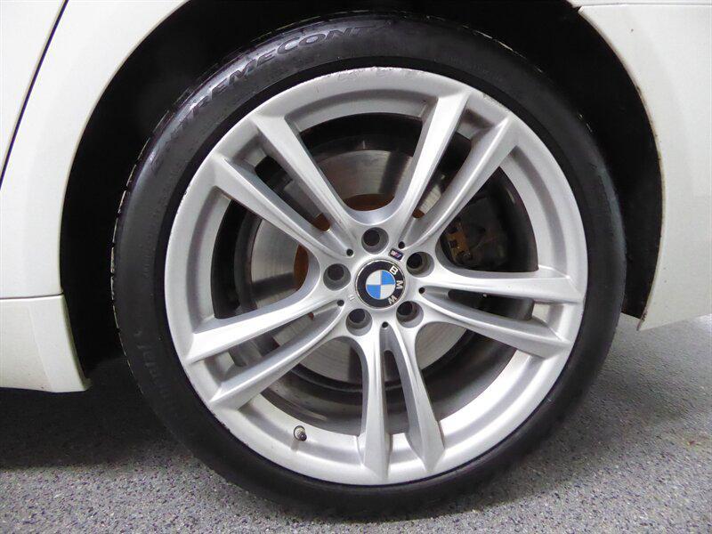 used 2013 BMW 750 car, priced at $12,500