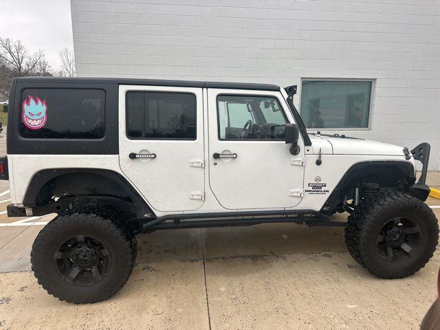 used 2015 Jeep Wrangler Unlimited car, priced at $15,991