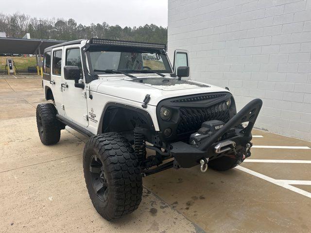 used 2015 Jeep Wrangler Unlimited car, priced at $15,991