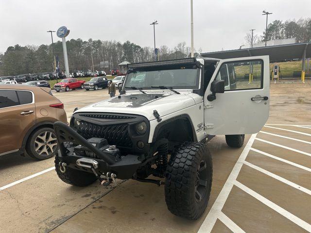 used 2015 Jeep Wrangler Unlimited car, priced at $15,991