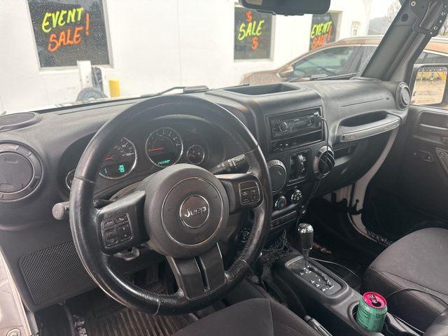 used 2015 Jeep Wrangler Unlimited car, priced at $15,991