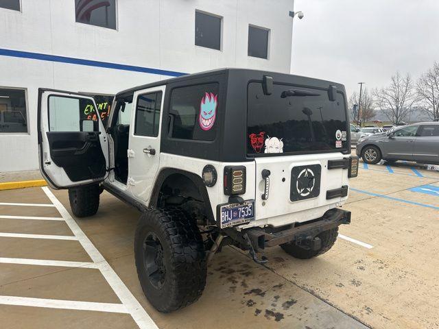 used 2015 Jeep Wrangler Unlimited car, priced at $15,991