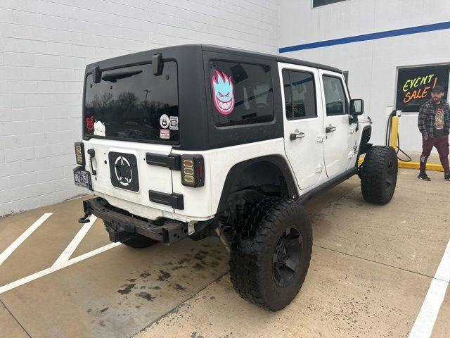 used 2015 Jeep Wrangler Unlimited car, priced at $15,991