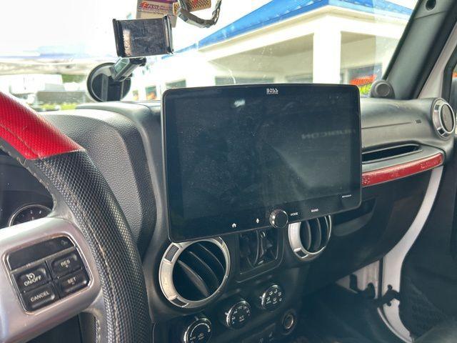 used 2014 Jeep Wrangler Unlimited car, priced at $16,981