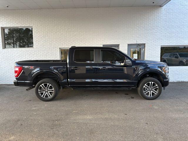 used 2023 Ford F-150 car, priced at $39,348