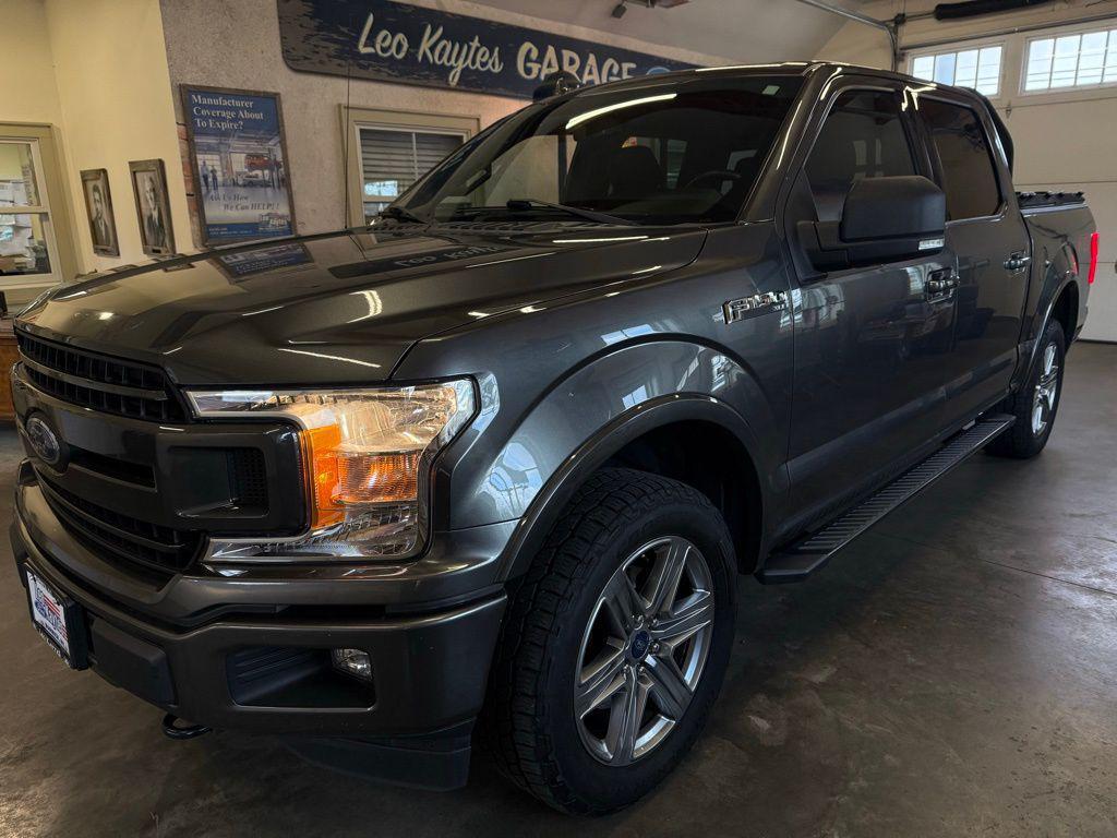 used 2018 Ford F-150 car, priced at $26,001