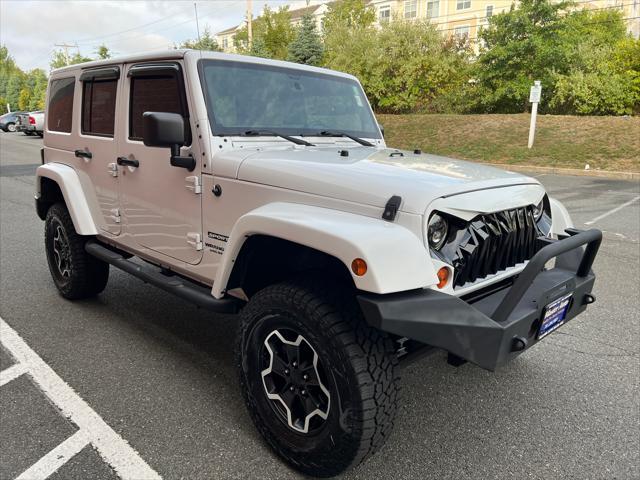 used 2013 Jeep Wrangler Unlimited car, priced at $16,999