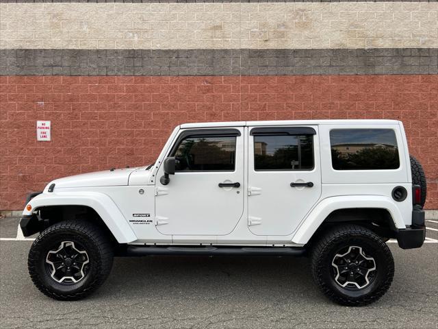 used 2013 Jeep Wrangler Unlimited car, priced at $16,999