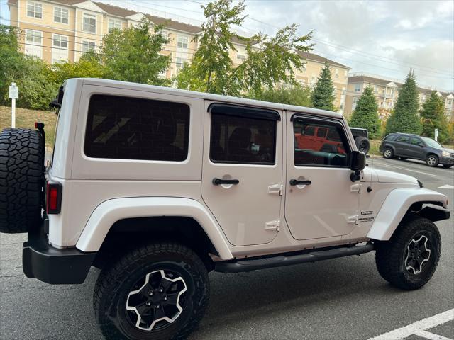 used 2013 Jeep Wrangler Unlimited car, priced at $16,999