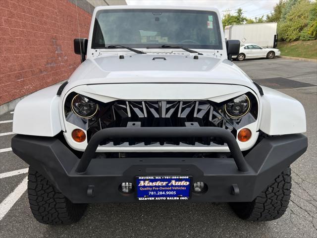 used 2013 Jeep Wrangler Unlimited car, priced at $16,999