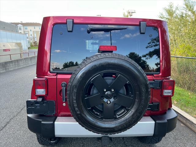 used 2011 Jeep Wrangler Unlimited car, priced at $13,999