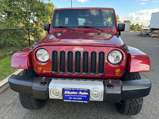 used 2011 Jeep Wrangler Unlimited car, priced at $13,999