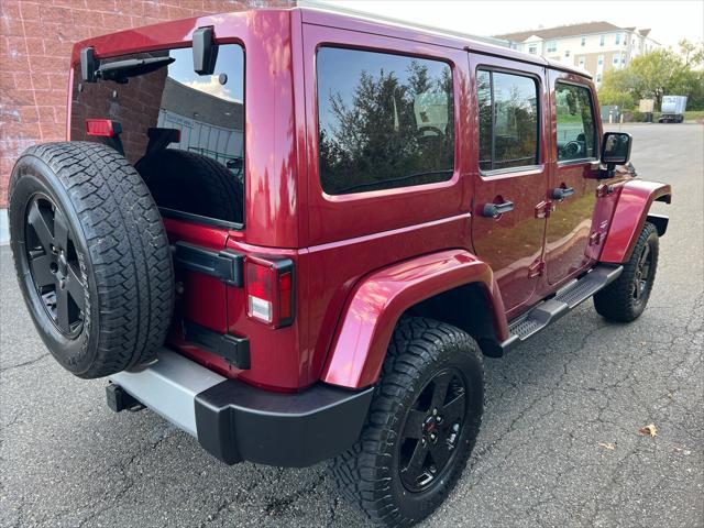 used 2011 Jeep Wrangler Unlimited car, priced at $13,999