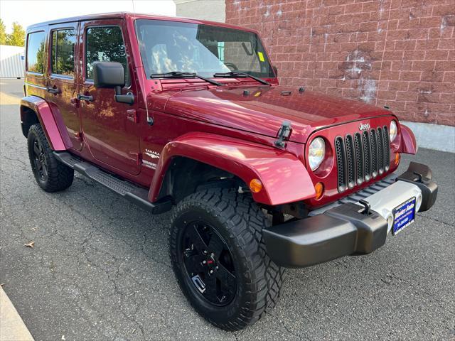 used 2011 Jeep Wrangler Unlimited car, priced at $13,999