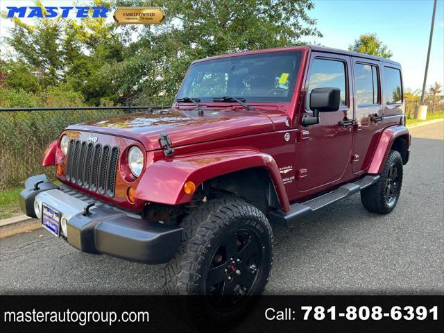 used 2011 Jeep Wrangler Unlimited car, priced at $13,999