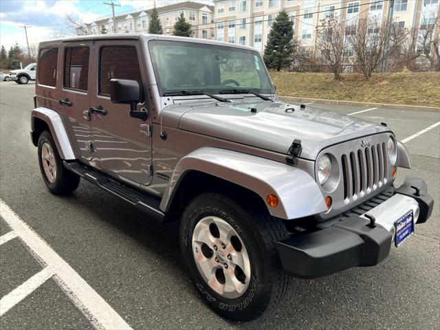 used 2013 Jeep Wrangler Unlimited car, priced at $17,999